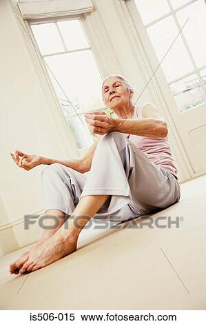 Stock Photography - Woman doing yoga. Fotosearch