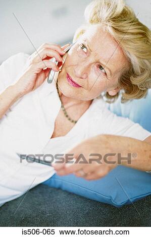 Stock Photography - Woman talking on cellphone. Fotosearch
