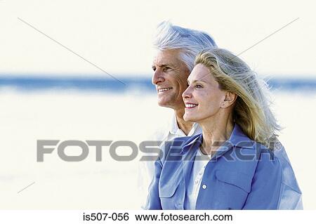 Couple by the sea View Large Photo Image Stock Photograph - Couple by the sea . Fotosearch