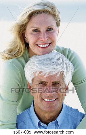 Stock Photography - Couple by the sea . Fotosearch