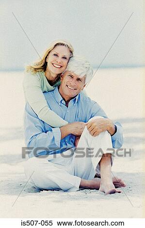 Stock Photography - Couple by the sea . Fotosearch
