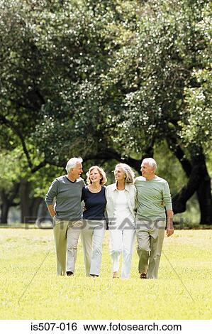 Stock Photograph - Friends in the park. Fotosearch