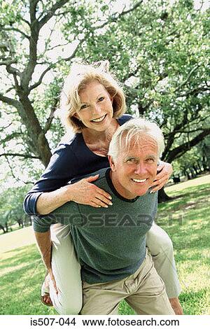 Intimate couple in park View Large Photo Image Picture - Intimate couple in park. Fotosearch