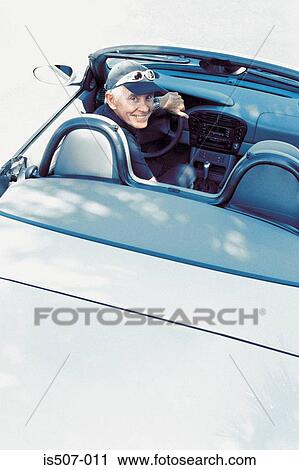 Man with his porche convertable View Large Photo Image Stock Image - Man with his porche convertable. Fotosearch