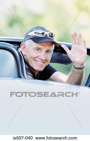 Man with his porche convertable View Large Photo Image Stock Image - Man with his porche convertable. Fotosearch