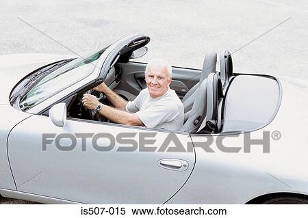 Man with his porche convertable View Large Photo Image Stock Photography - Man with his porche convertable. Fotosearch