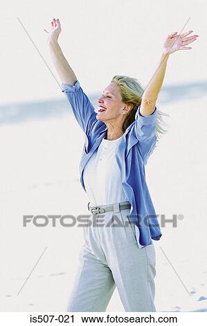 Woman stretching by the sea View Large Photo Image Stock Image - Woman stretching by the sea. Fotosearch