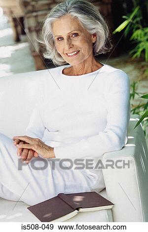 Ageing woman outdoors View Large Photo Image Stock Photo - Ageing woman outdoors. Fotosearch