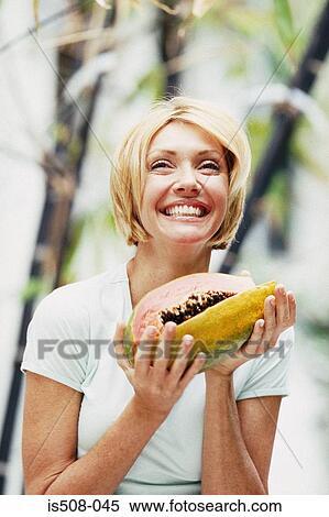 Woman eating outdoors View Large Photo Image Stock Photography - Woman eating outdoors. Fotosearch