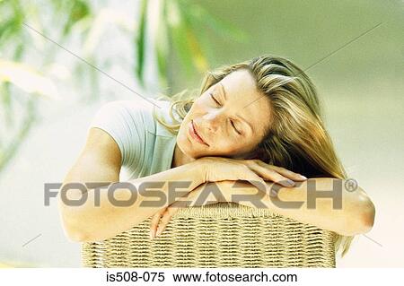Woman relaxing outdoors View Large Photo Image Stock Photography - Woman relaxing outdoors. Fotosearch