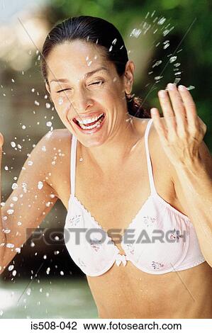 Woman washing outdoors View Large Photo Image Stock Image - Woman washing outdoors. Fotosearch