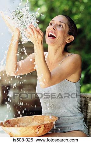 Woman washing outdoors View Large Photo Image Stock Photography - Woman washing outdoors. Fotosearch