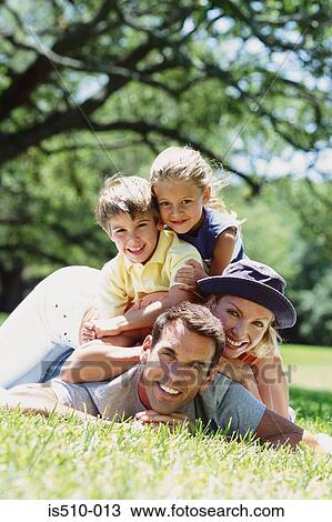 Stock Image - Family in the park. Fotosearch