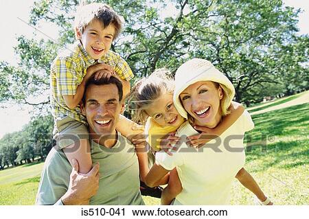 Stock Image - Family in the park. Fotosearch