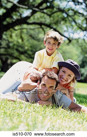 Stock Image - Family in the park. Fotosearch