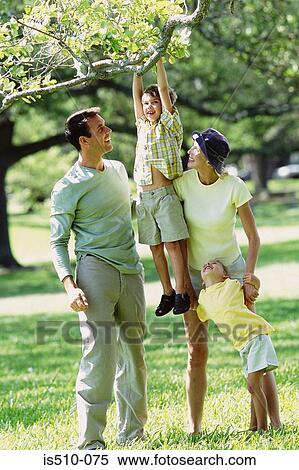Family in the park View Large Photo Image Stock Photography - Family in the park. Fotosearch