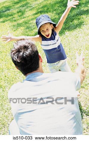 Girl running to her father View Large Photo Image Stock Image - Girl running to her father. Fotosearch