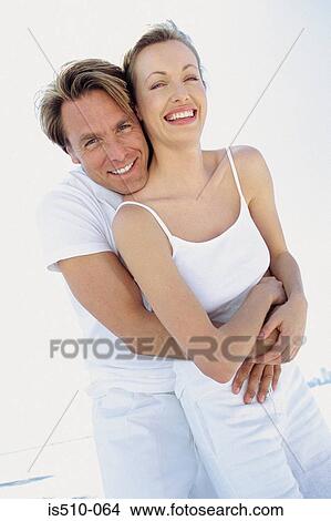 Man and woman embracing View Large Photo Image Picture - Man and woman embracing. Fotosearch