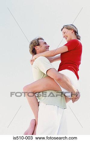 Man and woman embracing View Large Photo Image Stock Image - Man and woman embracing. Fotosearch