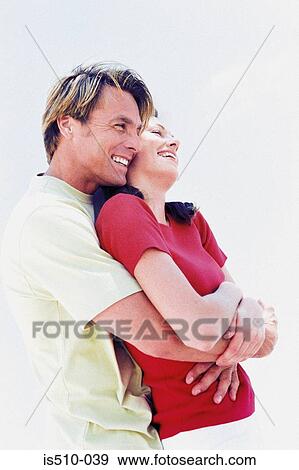Man and woman embracing View Large Photo Image Stock Photo - Man and woman embracing. Fotosearch