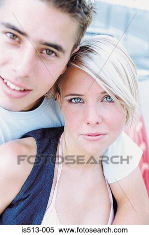 Stock Photography - Portrait of young couple. Fotosearch