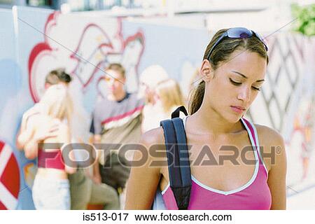 Stock Photo - Young woman looking sad. Fotosearch