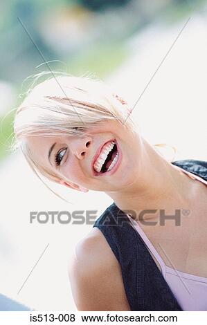 Young woman smiling View Large Photo Image Stock Photo - Young woman smiling. Fotosearch