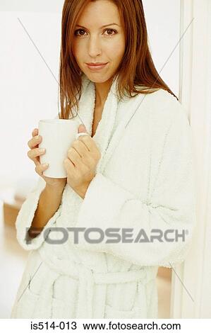 Woman holding cup of tea View Large Photo Image Stock Image - Woman holding cup of tea. Fotosearch