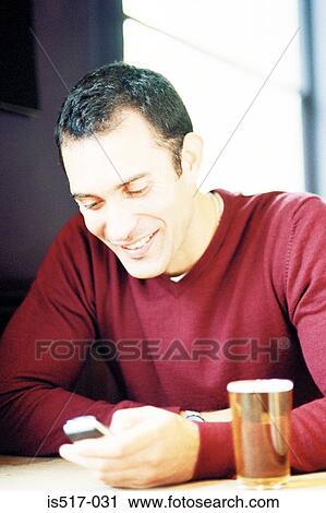 Man with beer View Large Photo Image Stock Image - Man with beer. Fotosearch