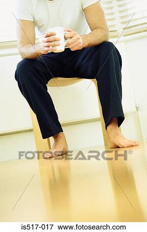 Man with cup of tea View Large Photo Image Stock Photo - Man with cup of tea. Fotosearch