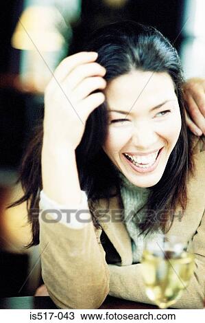 Stock Image - Woman laughing. Fotosearch
