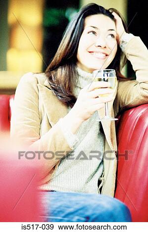 Woman with wine View Large Photo Image Stock Photo - Woman with wine. Fotosearch