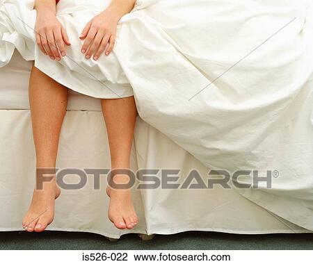Stock Image - A woman getting up. Fotosearch