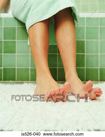 Feet getting out of the bath View Large Photo Image Stock Image - Feet getting out of the bath. Fotosearch