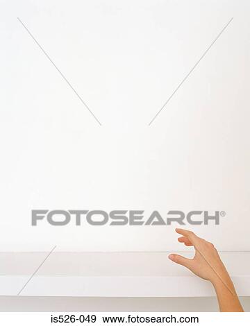 Reaching for missing object View Large Photo Image Stock Photo - Reaching for missing object. Fotosearch