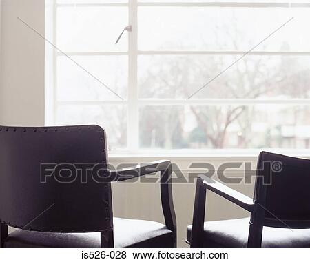 Pictures Of Two Leather Chairs Opposite A Window Is526 028 Search Picture Two Leather Chairs Opposite A Window Fotosearch Search Stock Photos Images