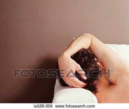 Young man sleeping on the couch View Large Photo Image Stock Photography - Young man sleeping on the couch. Fotosearch