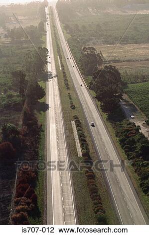 Stock Image - A long motorway. Fotosearch