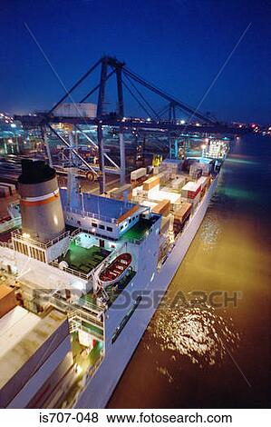 Stock Photo - Cargo ship at dock. Fotosearch