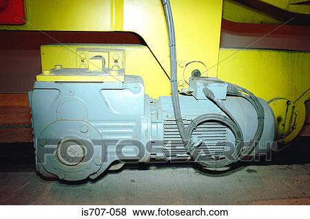 Stock Photo - Electric motor on the base of a modern container crane. Fotosearch