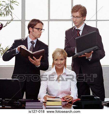 Stock Photo - Business people at work. Fotosearch