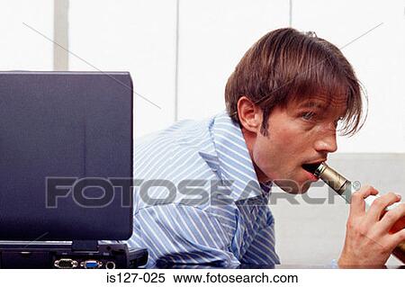Businessman drinking View Large Photo Image Stock Photography - Businessman drinking. Fotosearch