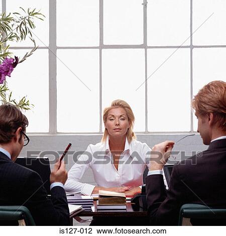 Sexy businesswoman in a meeting View Large Photo Image Stock Image - Sexy businesswoman in a meeting. Fotosearch