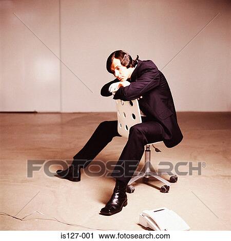 Stock Image - Thoughtful businessman. Fotosearch