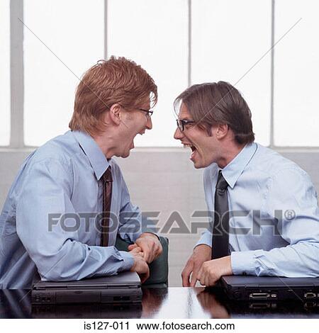 Two businessmen shouting at eath other View Large Photo Image Stock Image - Two businessmen shouting at eath other. Fotosearch