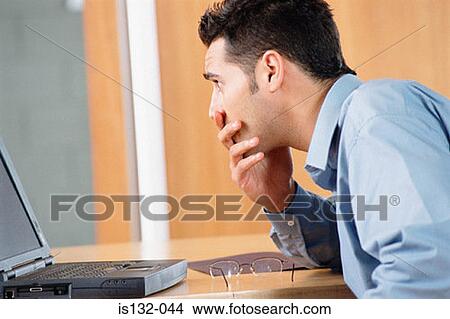 Businessman in office View Large Photo Image Picture - Businessman in office. Fotosearch