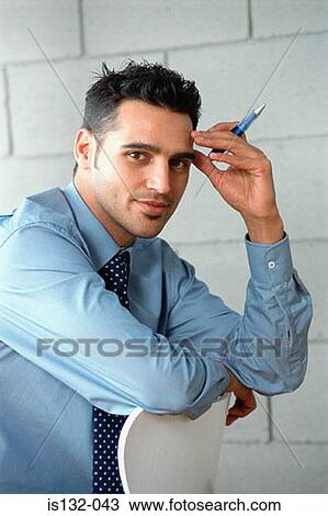 Businessman in office View Large Photo Image Stock Image - Businessman in office. Fotosearch
