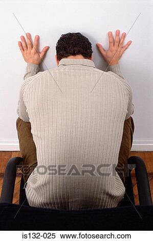 Businessman sitting by wall View Large Photo Image Stock Photography - Businessman sitting by wall . Fotosearch