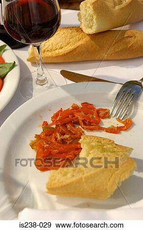 Peppers and bread on plate View Large Photo Image Stock Photo - Peppers and bread on plate. Fotosearch