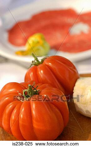 Tomatoes by plate View Large Photo Image Stock Photography - Tomatoes by plate. Fotosearch